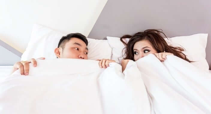 Man en vrouw in bed
